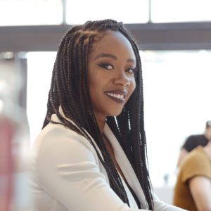 Ashleigh Burden, marketing manager at coterie insurance, And I Quote podcast host for season 3.